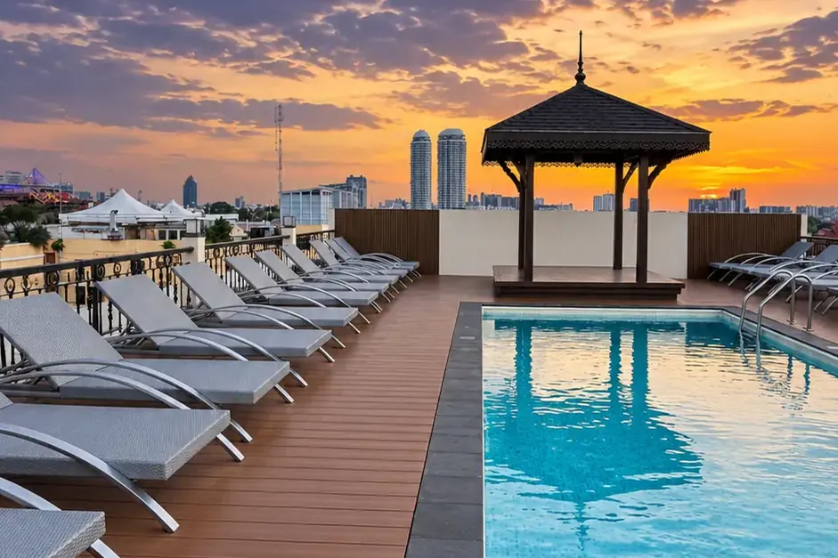 Khaosan Palace Hotel rooftop swimming pool at sunset